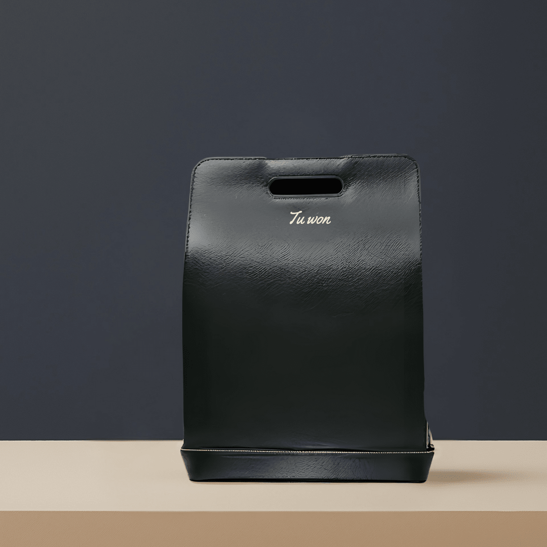 Luxury black leather backpack for professionals by Tuwon, designed in London with minimalist structure and premium finish