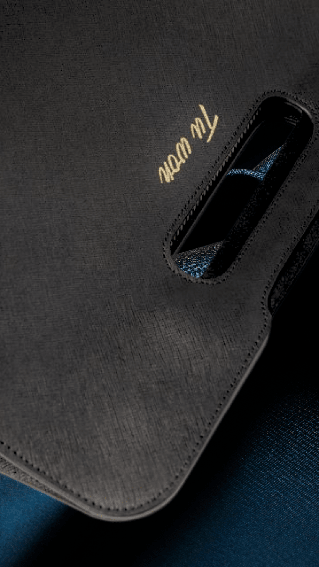 Close-up of Tuwon black leather backpack showing premium texture, stitching and high-quality craftsmanship detail