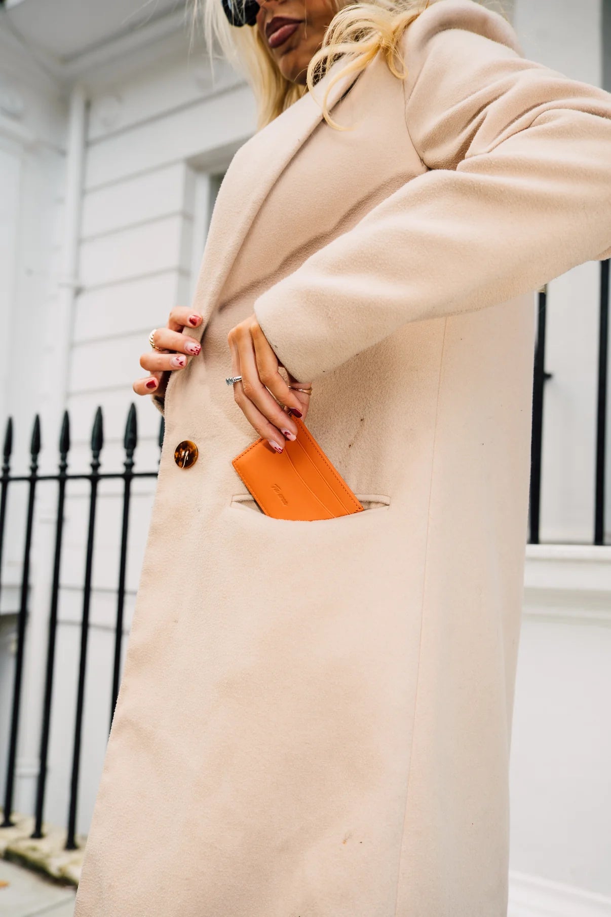 LNS orange Slim Tuwon leather wallet fitting in a pocket, designed for convenience, elegance and everyday carry