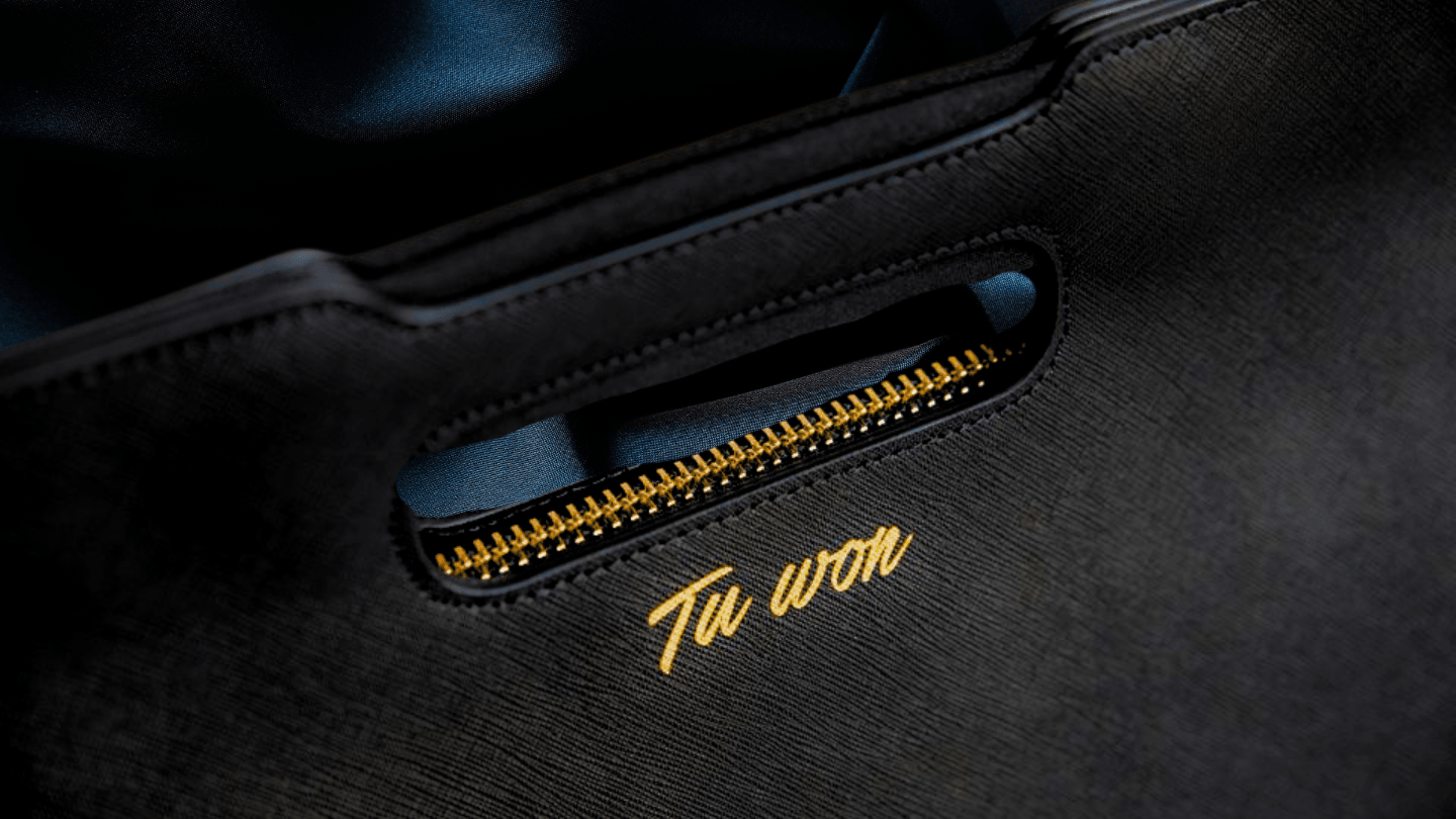 Minimalist luxury backpack in black leather by Tuwon, crafted for work, travel and everyday performance with sleek design